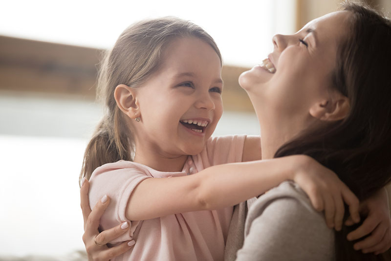 smiling mother and child